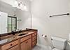 Main Level Hall Bath - combination tub/shower.  This bath serves Bedroom 2 and the Main Level living areas.