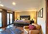 King Bedroom has wonderful views and access to Lower Level Deck