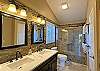 En-suite Bath with 2 sinks and walk-in Shower