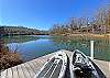 Lake House Retreat private dock with kayak, SUP board and john boat for guest use!