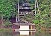 Welcome to Tranquility Chalet - nestled into the wooded waterfront setting of Bald Mountain Lake in Lake Lure.