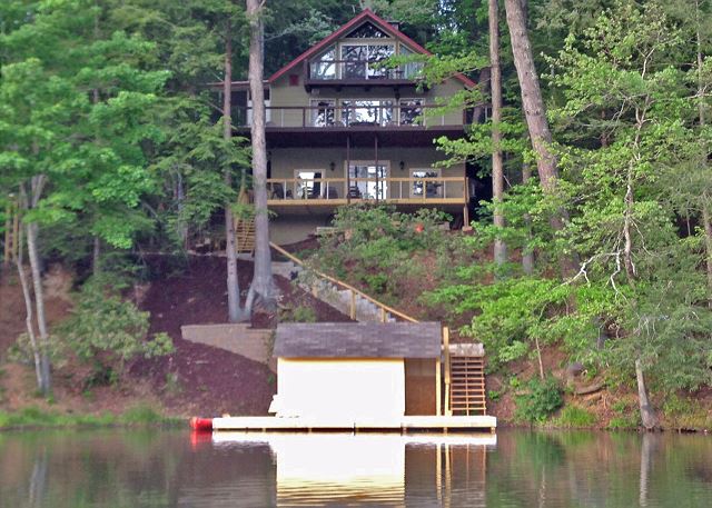 Welcome to Tranquility Chalet - nestled into the wooded waterfront setting of Bald Mountain Lake in Lake Lure.