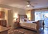 Main Level Master Bedroom with Queen Bed and Private Bath with combination tub/shower