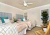 bedroom with two queen sized beds