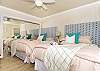 bedroom with two queen beds
