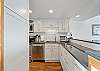 Newly renovated, fully equipped kitchen with stainless steel appliances and quartz countertops