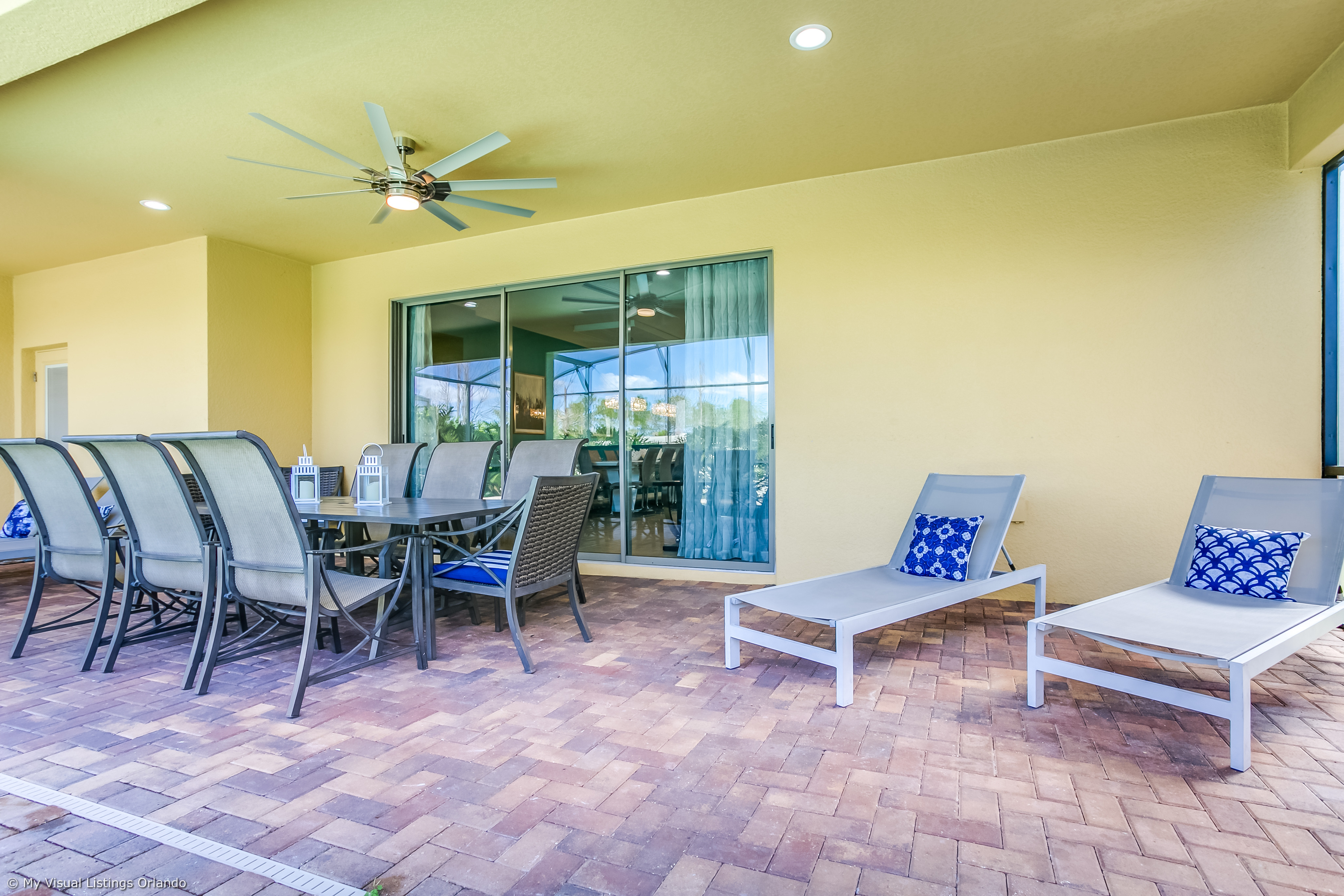 View 5 of grand patio with tables and loungers
