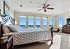 King-sized primary bedroom with Gulf views