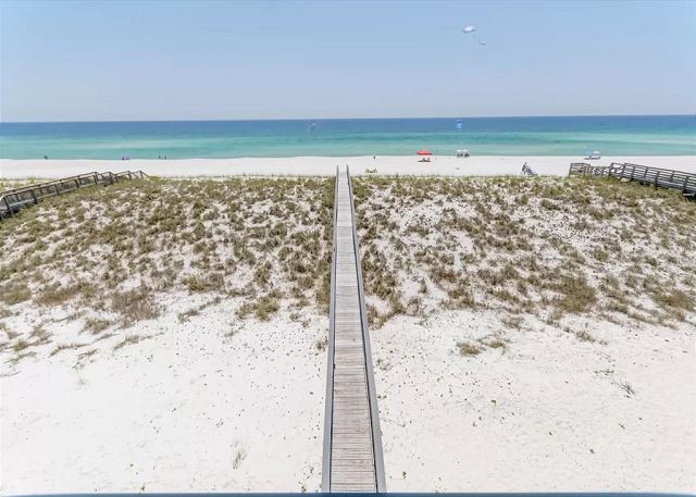 The private dune cross-over leads directly from your back door to the beach!