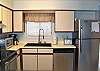 Fully equipped kitchen with stainless appliances