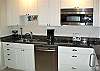 Granite countertops, combo oven/microwave, stove top and all small appliances