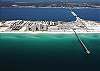 An aerial view of Navarre Beach with the longest pier on the Gulf of Mexico