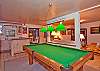 Den, with wet bar, pool table and TV