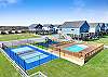 Community playground, pickle ball court and pool 