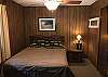Queen Bed Room with Ceiling Fan and TV/VCR
