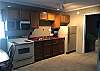Full Kitchen with Refrigerator, Microwave, Full Size Stove