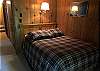Lower Level Double Bed Room with Slider Door to Out Door Shared Hot Tub (Winter)