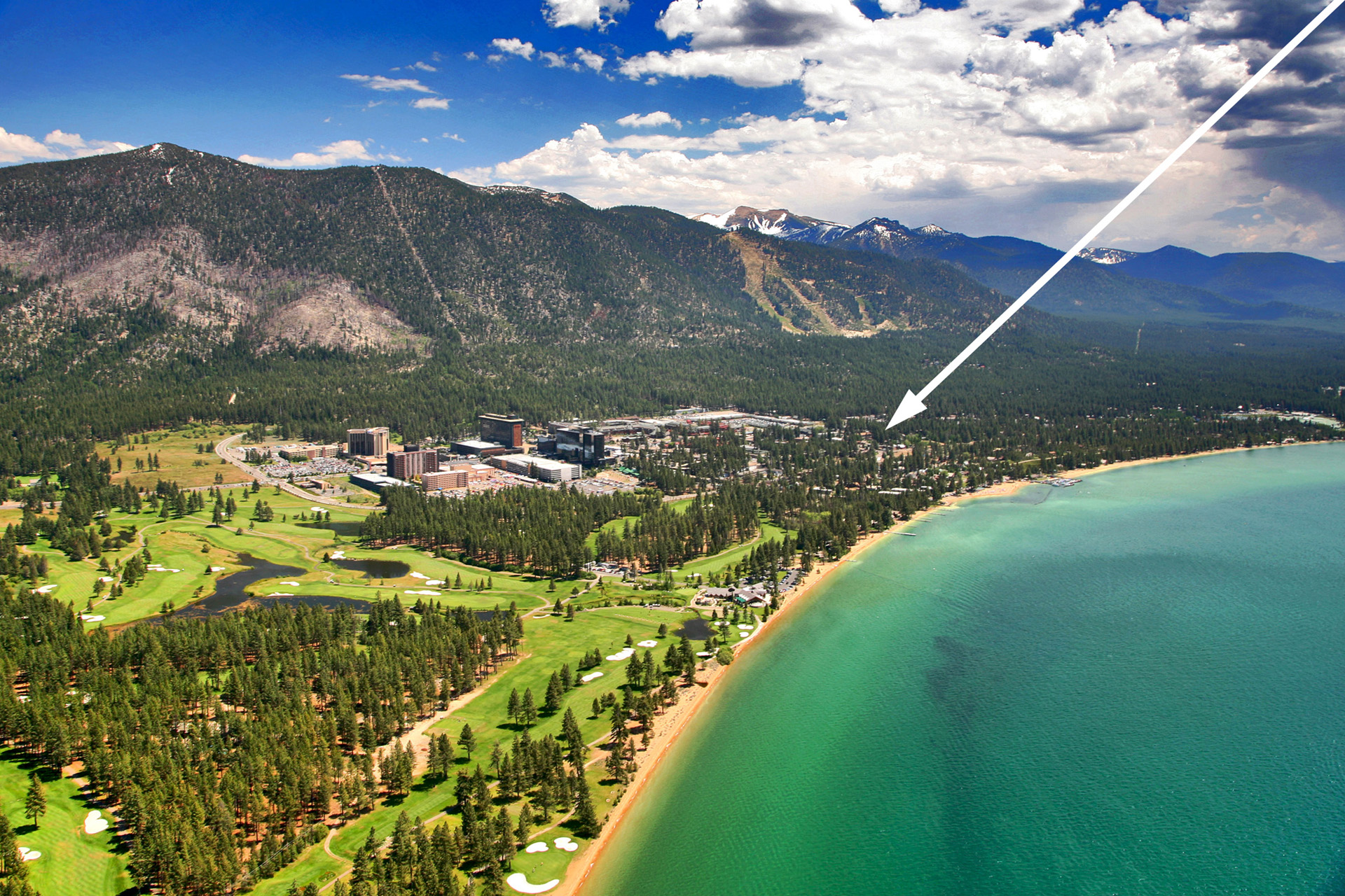 Stunning aerial view of South Lake Tahoe, highlighting the condo’s prime location