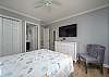 Bedroom 5 - on the upper level, on the North side and/or right as you're facing the street. Has a queen bed