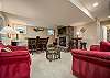 Basement Living Area with Bar & Fireplace