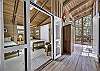Another view of first bedroom off of screened porch