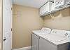 Full size washer and dryer in this roomy utility room.