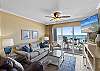Tastefully decorated living room with direct view to the Gulf.