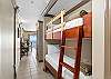 Hallway bunk beds for the little ones. They'll have their own space when you rent this two bedroom condo!