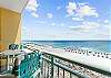 Several pub height balcony chairs and a table to enjoy an afternoon drink while marveling at the sunsets.