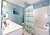Captivating Master Bathroom features a tub/shower combo 