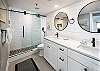 Walk in shower and double vanity in this master bath.