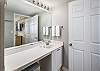 Extra vanity space makes this master bath comfy!