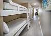 With the bunks and the sleeper, this one bedroom sleeps 6 guests.