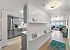 Kitchen is immediately to your left as you enter the condo.
