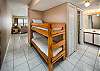 Bunks conveniently tucked away in a corner for your smaller guests.