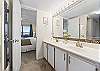 Has access from the master bedroom and the halway. His and hers sinks with plenty of room to get ready!