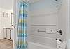 Shower/tub combo.