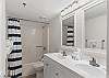 This bathroom also has double sinks with extra vanity space