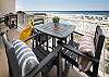 Enjoy a beverage out on the balcony table