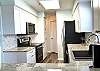 Features stainless steel appliances with lots of cabinet & counter space