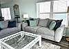 Enjoy this colorful & spacious living room with plenty of seats for everyone!