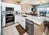 Large kitchen with plenty of counter space and storage.