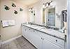 Master bath has double vanities and sinks.