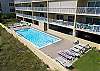 Plenty of space to lounge around the pool.