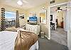This bedroom has a TV & a window for more Florida sunshine 