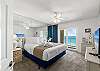 Features a king bed, full bath, and access to the balcony with a beach front view