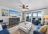 Plenty of seating in the living room with spectacular views of the beach!
