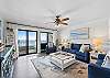 Plenty of seating in the living room with views of the beach!