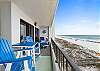 A set of bar height chairs makes this balcony perfect!