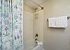 Guest Bathroom with a shower/tub combo